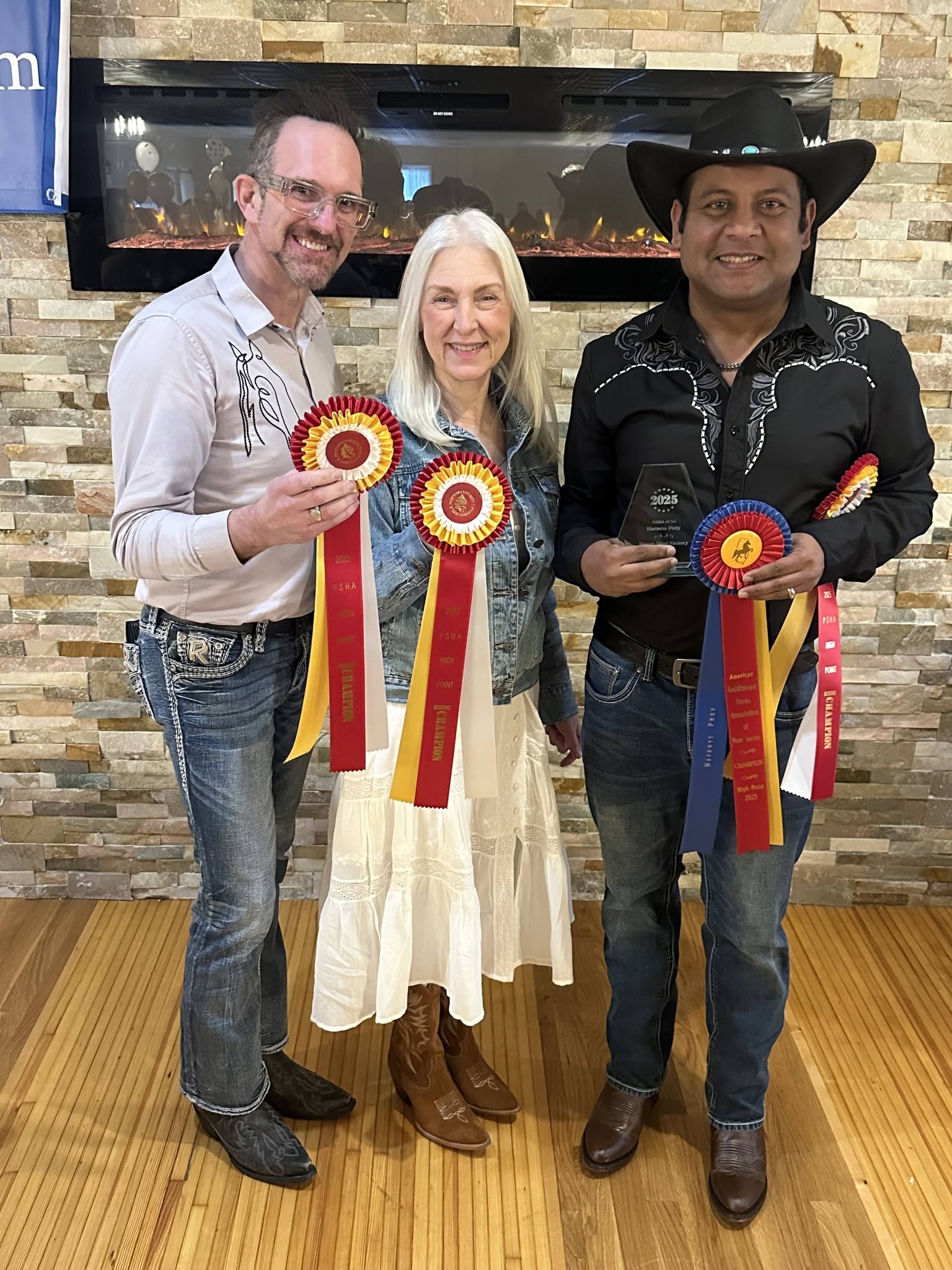 Riders from Thunder Ridge Farms with championship ribbons