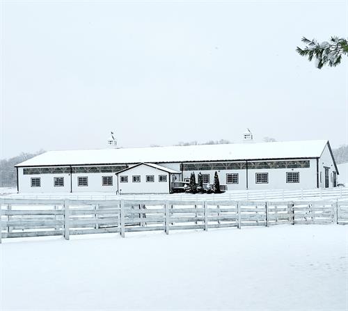 Thunder Ridge Farms barn covered in fresh snow — lessons run year-round, Tuesday through Sunday